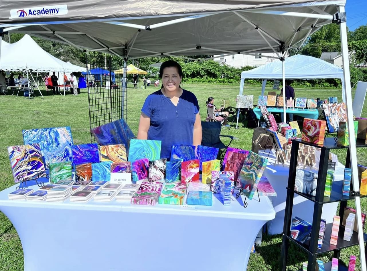 Domita Bowman with her art at Parkridge Art Festival