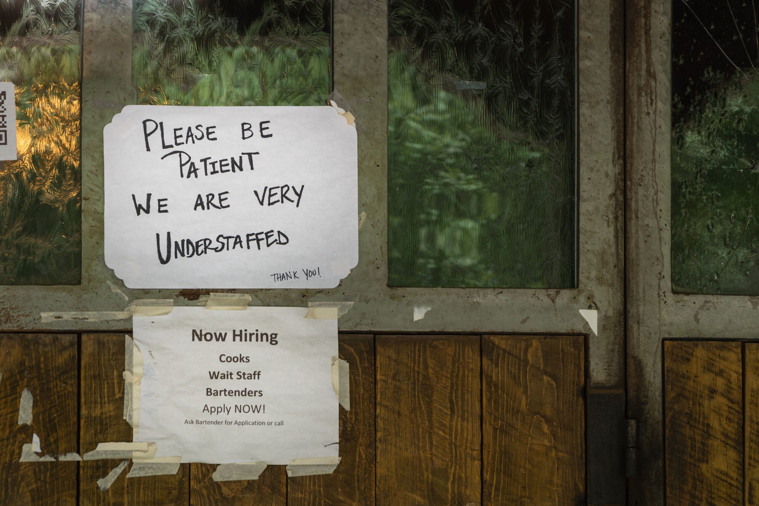 Image showing restaurant sign stating that they are understaffed.